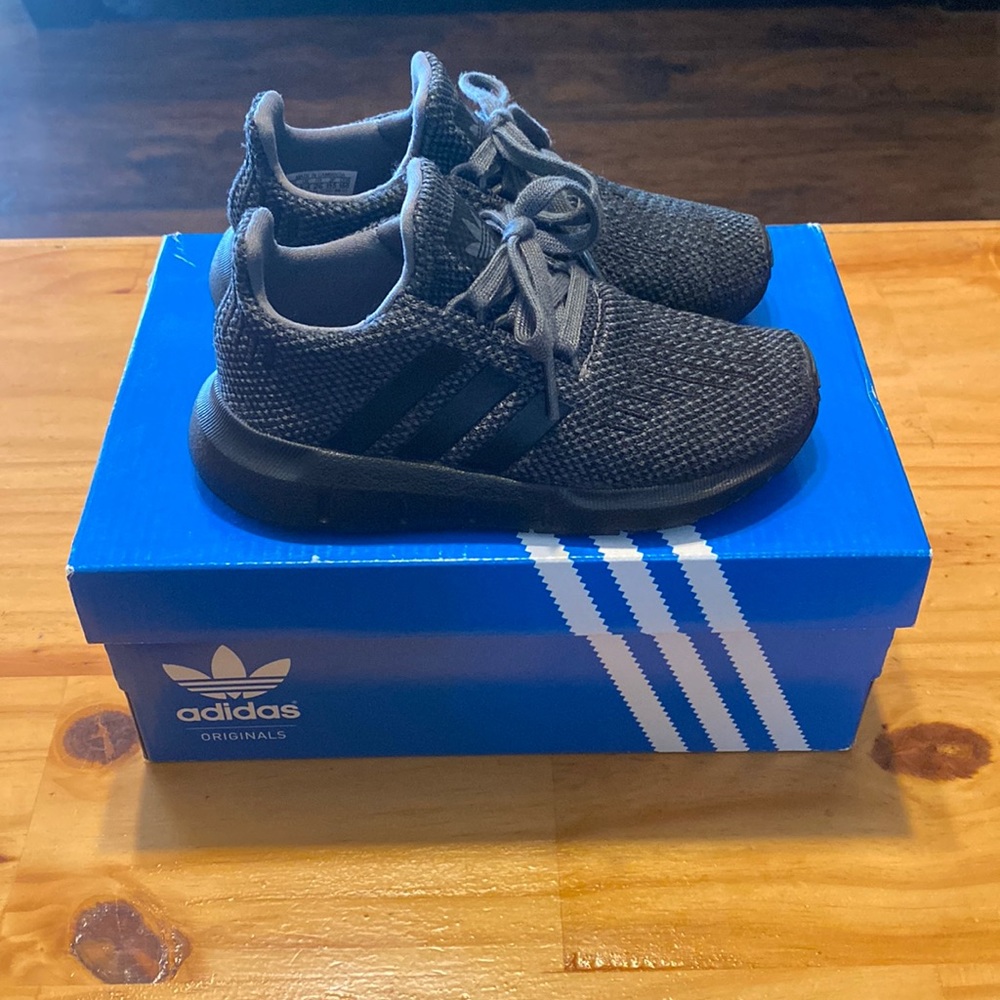 Black adidas in a size 9